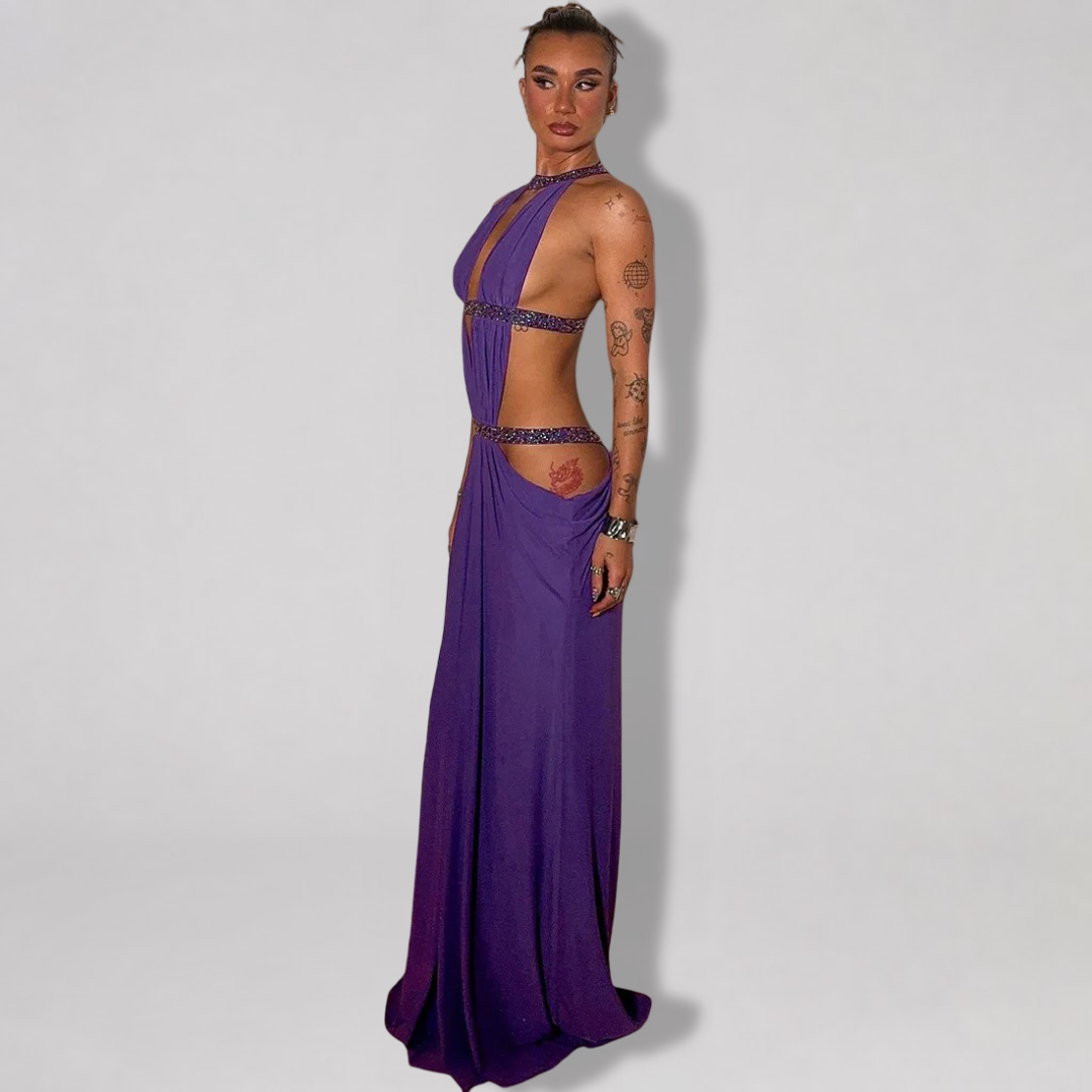 Backless halter maxi dress with metallic trim cutouts at chest and waist