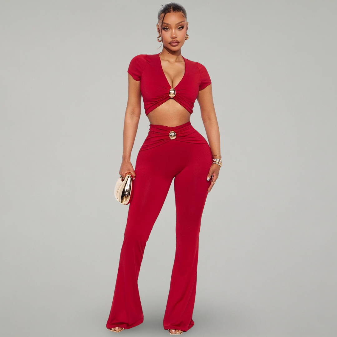 Woman wearing a red outfit with a gray background