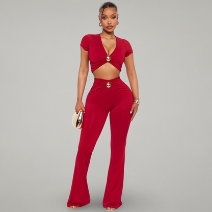 Woman wearing a red outfit with a gray background