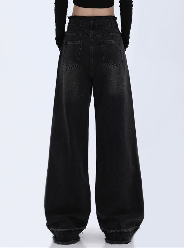 Black wide-leg jeans on a white background