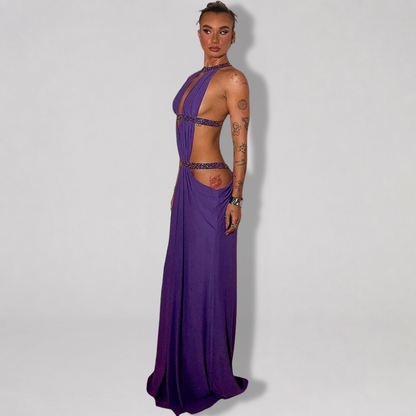 Backless halter maxi dress with metallic trim cutouts at chest and waist
