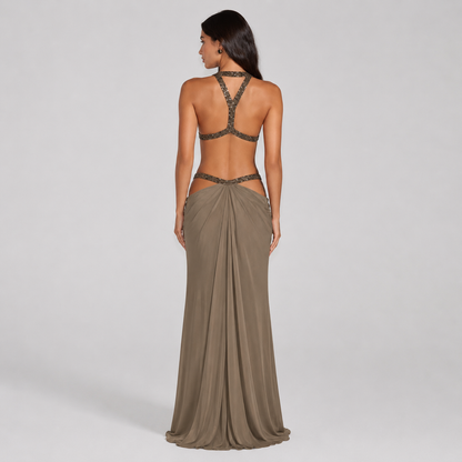 Backless halter maxi dress with metallic trim cutouts at chest and waist

