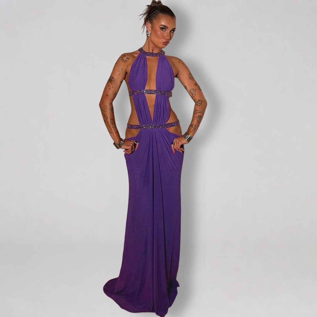 Backless halter maxi dress with metallic trim cutouts at chest and waist
