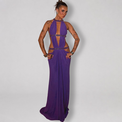 Backless halter maxi dress with metallic trim cutouts at chest and waist
