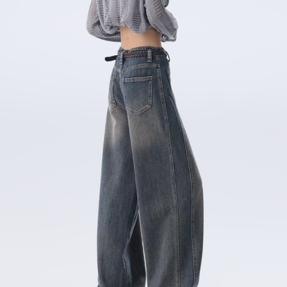 High-waisted wide-leg vintage jeans for women with raw hem and collage stitching in washed blue denim