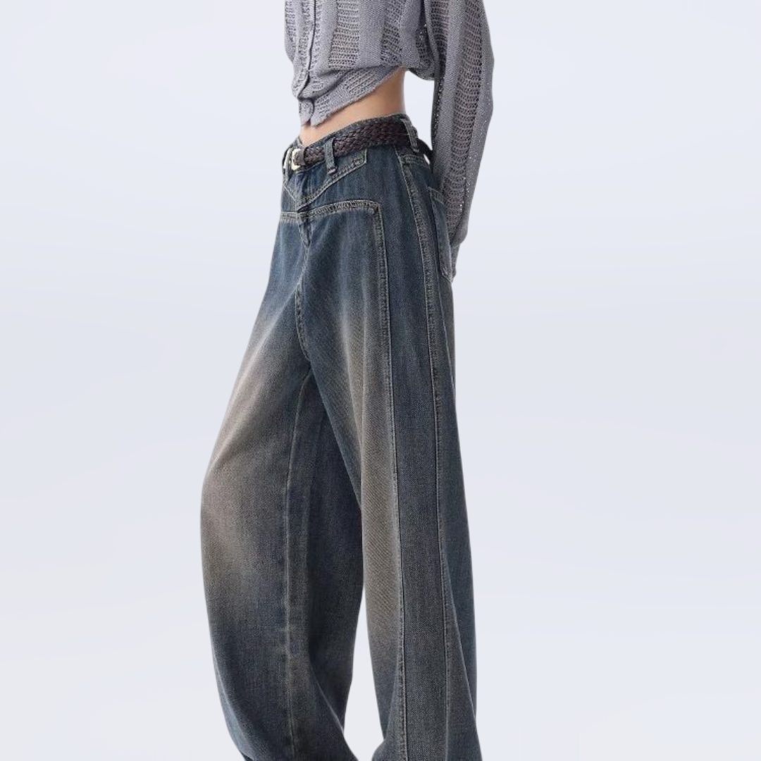 High-waisted wide-leg vintage jeans for women with raw hem and collage stitching in washed blue denim