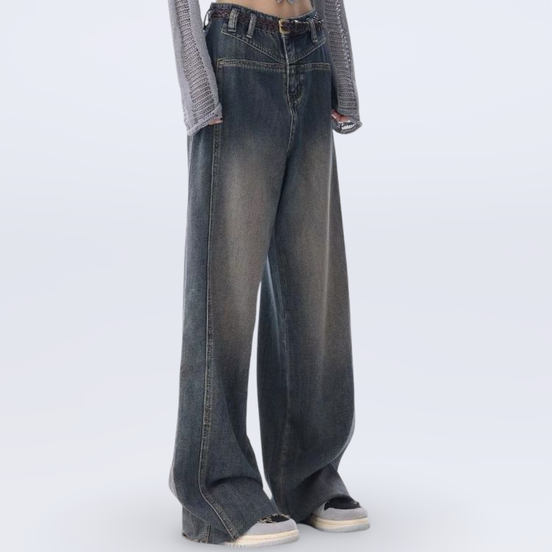 High-waisted wide-leg vintage jeans for women with raw hem and collage stitching in washed blue denim