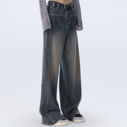 High-waisted wide-leg vintage jeans for women with raw hem and collage stitching in washed blue denim