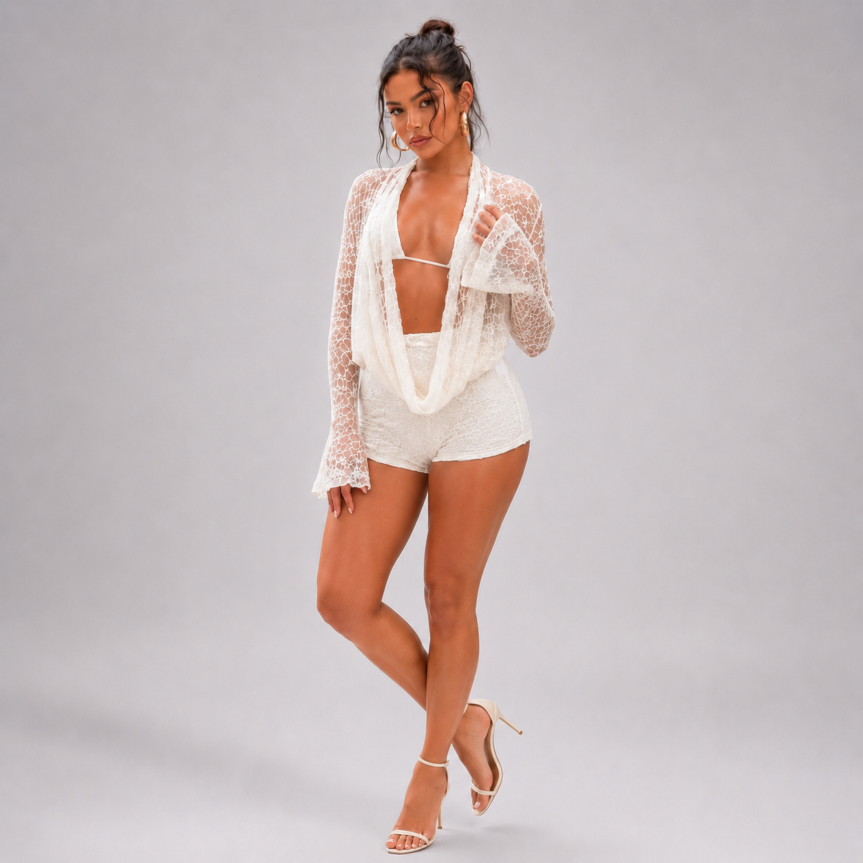 Cream lace halter set with long flare sleeves and lace-up shorts
