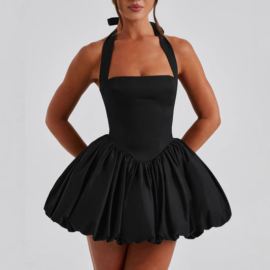 Model wearing lace-up halter puffy dress, chic date night outfit