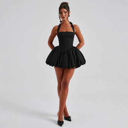 Model wearing lace-up halter puffy dress, chic date night outfit